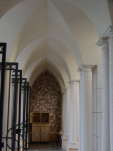 Colonnade with a groined vaulted ceilings. An impressive use of decorative front porch columns